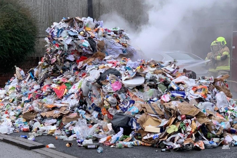 Battery-powered vacuum cleaner sparks bin lorry fire image