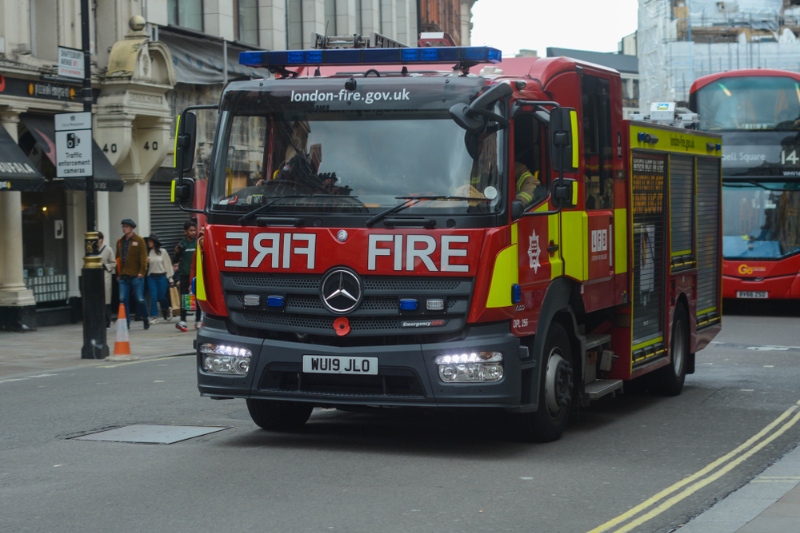 Bin lorry bursts into flames in London image